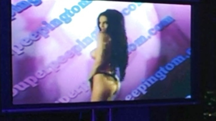 Julie Strain Nude as Exotic Dancer. Breasts, Thong, black hair, black thong. 602834