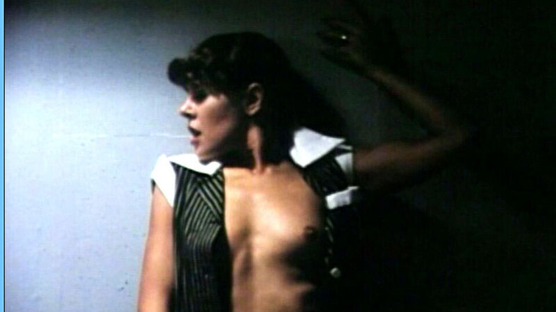 Michelle Bauer Naked as Lana. Breasts, black shirt, dark. 605121