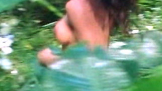 Janet Jackson Nude in Janet - Live in Hawaii. Breasts, Black, back exposed. 596680