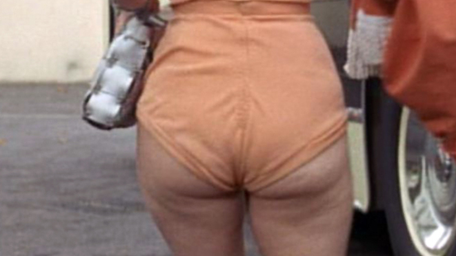 Carry On Camping's Sexiest Scenes with Barbara Windsor. Sexy, orange bikini, view from behind. 581970
