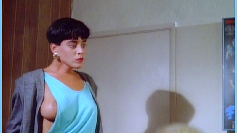 Nudes of Martine from Bad Girls from Mars. Breasts, black hair, blue tank top. 555048