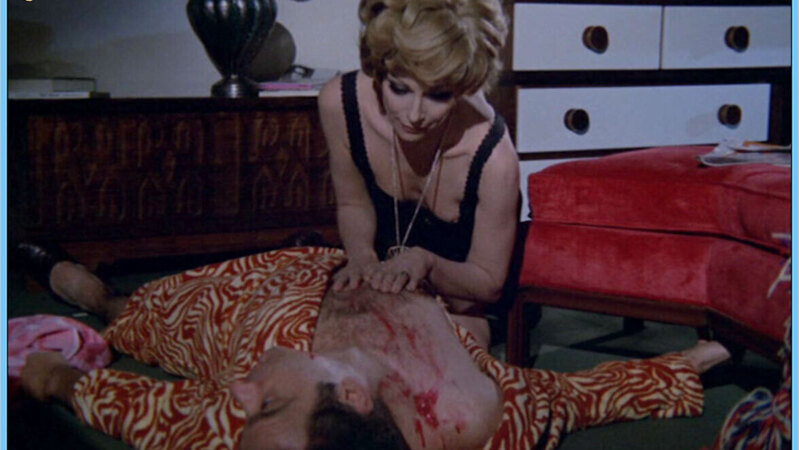 Falesse / Ester from In the Folds of the Flesh Naked. Breasts, black dress, blonde. 588377