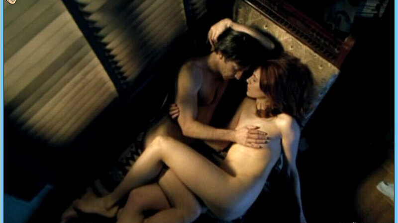 Nudes of Hélène Maier from Mortel transfert. Breasts, couple in bed, hand on breast. 590208