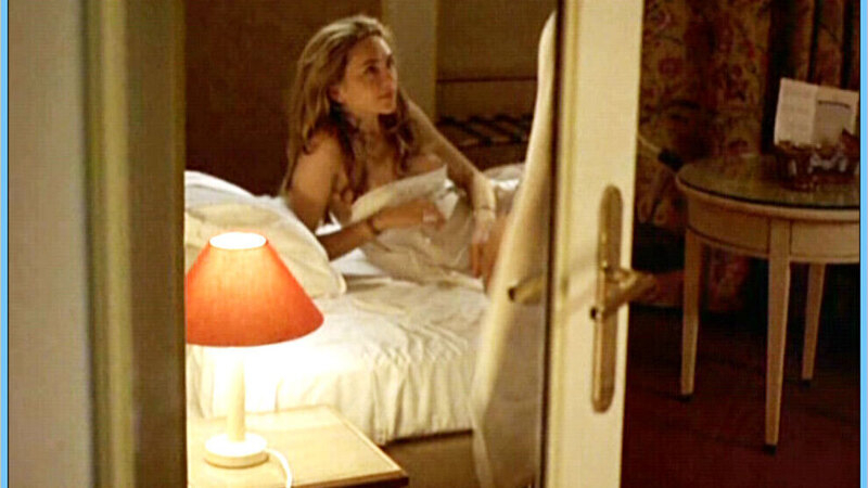 Nudes of Young Woman at Hotel from Une affaire de goût. Breasts, brunette, covering up with blanket. 599082