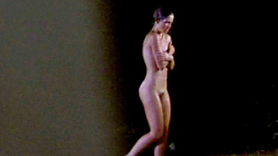 Kirsten Baker Naked in Friday the 13th Part 2. Bush, arms covering breasts, getting out of water. 590575