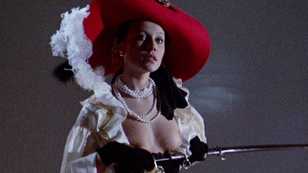 Angela Covello Naked in Baba Yaga. Breasts, big hat, black leggings. 706753
