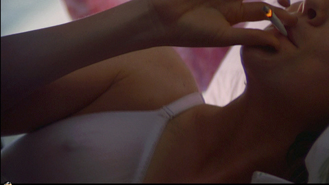 Laurel Holloman in Boogie Nights (1997) Underwear Laying In Bed Nipple Through Bra 681512