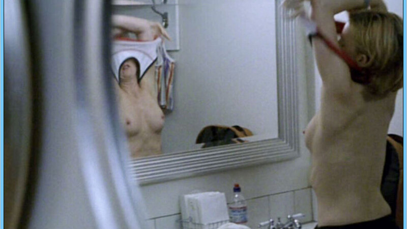 Laurel Holloman Nude as Tina Kennard. Breasts, blonde, looking in mirror. 660218