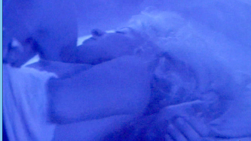 Pamela Thompson Nude as Dee. Breasts, blonde, blue light. 551552