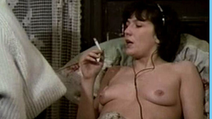 Nudes of La fille à Angoulême from Next Year If All Goes Well. Breasts, black hair, headphones. 533196