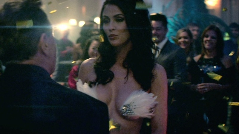 Sexiest Summer Altice Scene in Heist. Sexy, cleavage, feathers over nipple. 780157