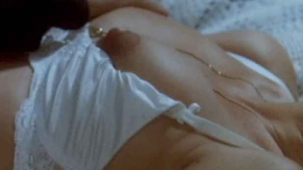 Daniela Poggi Nude as Luisa. Breasts, bra pulled down, hard nipples. 690260