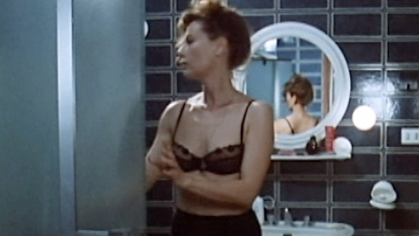 Sexiest Daniela Poggi Scene in Submission of a Woman. Underwear, black bra, black skirt. 690265