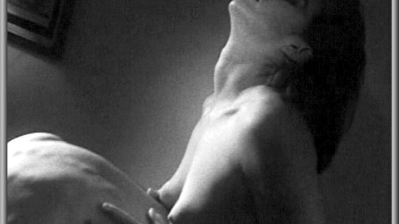 Dominique Gaspar Nude as Dominique. Breasts, back exposed, black and white. 583424