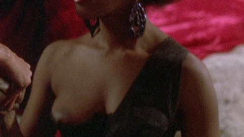 Marsha A. Hunt in Howling II: Your Sister Is a Werewolf (1985) Breasts Sexy Black Breast Out Of Dress 769738