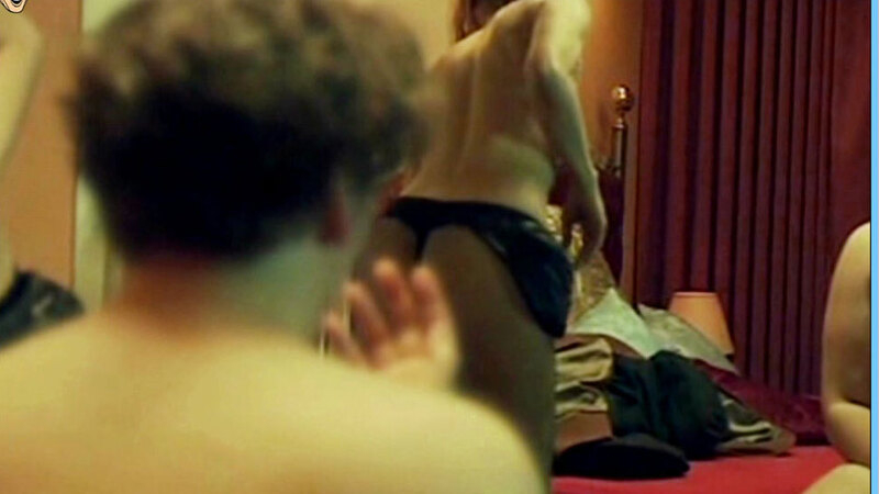 Sexiest Scenes of Prostitute from Liebe der Lieblosen. Underwear, back exposed, black thong. 639809