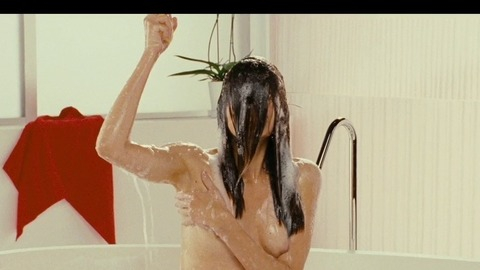 Louise Monot in Girl on a Bicycle (2013) Breasts Arm Covering Breasts Bathtub 737768