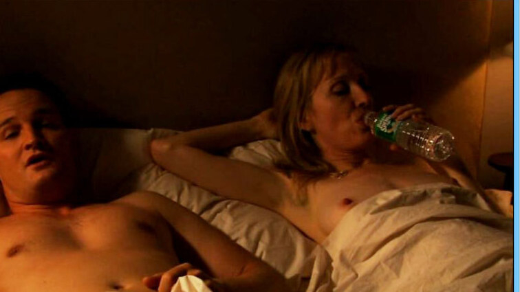 Nudes of Dana Chase from Brotherhood. Breasts, arm raised, couple in bed. 664362