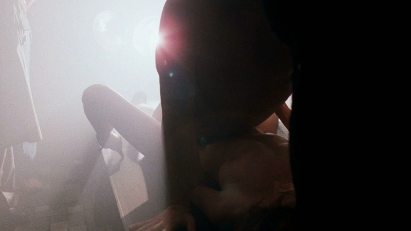 Petina Cole Naked as Woman on Stage at Porno House. Breasts, bright light, heels. 708441