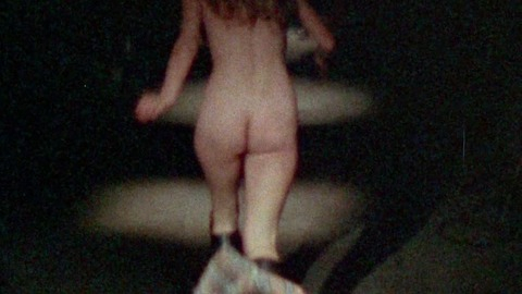 Natasha D'Natalie from Bloodsucking Freaks Naked. Butt, back exposed, chains. 749459