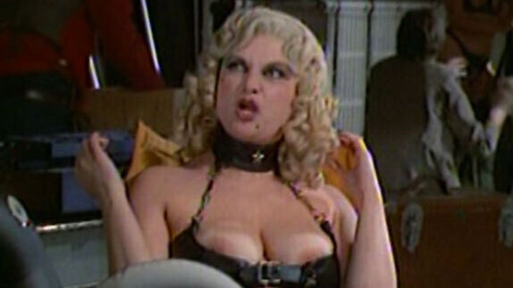 Beth Porter Nude in Eskimo Nell. Breasts, leather corset, nude. 593296
