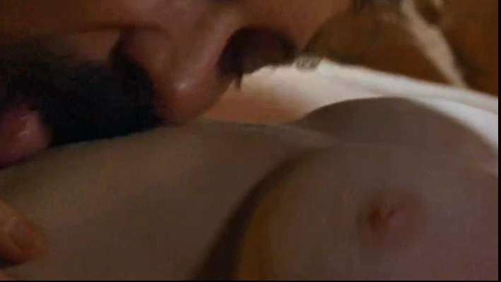 Linda Lovelace from Lovelace Naked. Breasts, bed, breast close-up. 727685
