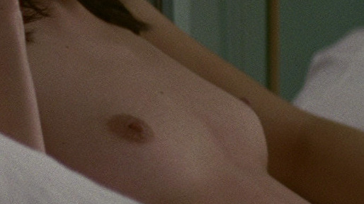 Olivia Wilde Naked as Angela Holden. Breasts, cigarette, hoop earrings. 785019