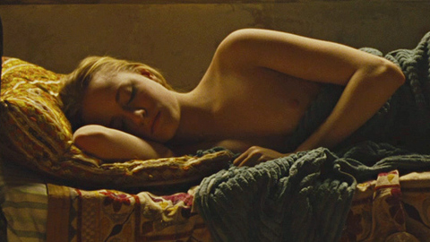 Nudes of Lucy Carrigan from Across the Universe. Breasts, hard nipple, laying in bed. 690900