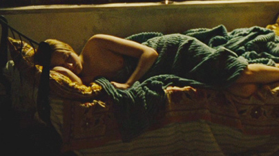 Evan Rachel Wood Nude as Lucy Carrigan. Breasts, laying in bed, left breast. 690902
