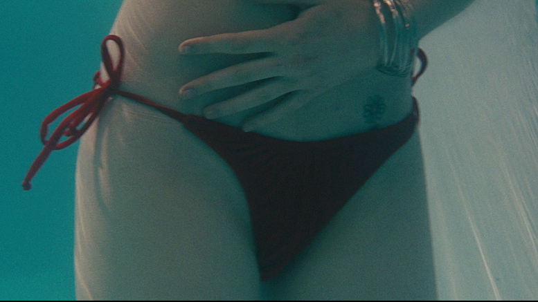 Hottest Evan Rachel Wood Scene in The Life Before Her Eyes. Bikini, SFW, close-up. 681044