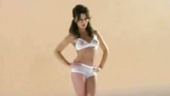 Sexiest Herself / Uschi Obermaier Scenes. Underwear, black hair, hands on hip. 641008
