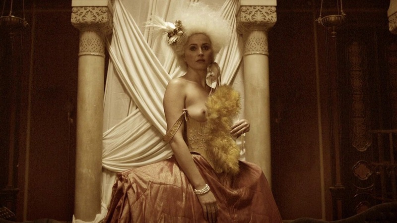 Véra from Maison Close Naked. Breasts, amber dress, fur scarf. 756821
