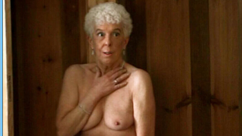 Yvette Jørgensen Naked in Helmer and Son. Breasts, gray hair, hand on crotch. 643879