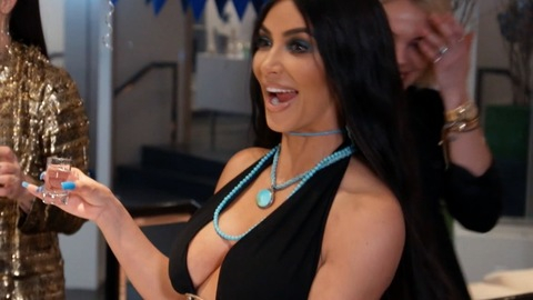 Sexiest Scenes of Herself from Keeping Up with the Kardashians. Sexy, blue nails, blue necklace. 847397