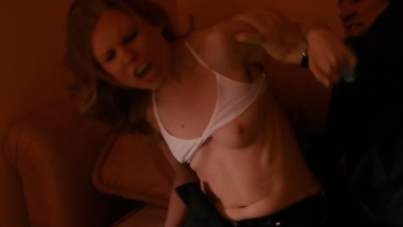 Female Journalist from Welcome to New York Naked. Breasts, bra pulled up, man grabbing woman. 741017