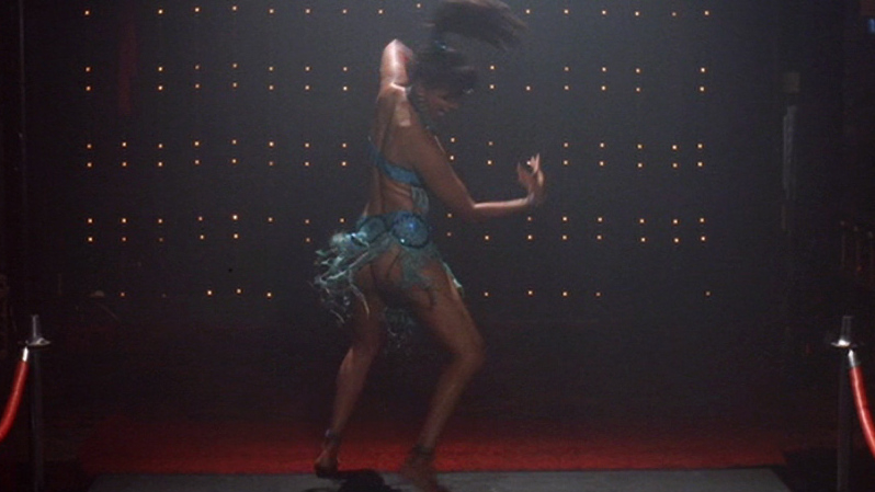 Ms. Labia Mirage from Roadside Prophets Naked. Butt, black hair, blue dance outfit. 669167