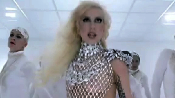 Hottest Lady Gaga Scene in Bad Romance. Sexy, blonde, breasts behind chainmale. 677942