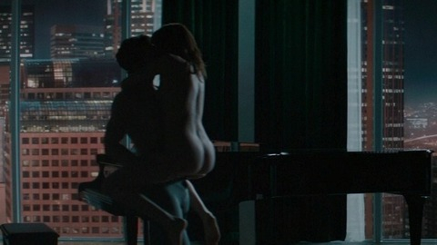 Anastasia Steele from Fifty Shades of Grey Naked. Butt, brunette, man holding woman. 763079