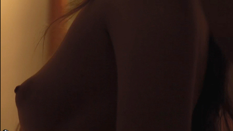 Genevieve from Green Naked. Breasts, hard nipples, man behind woman. 719825