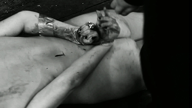 Georgia Goodrick Naked in The Human Centipede II. Butt, back exposed, black and white. 706519