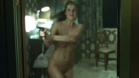 Nudes of NA from Headhunters. Breasts, Bush, brunette, holding gun. 714612