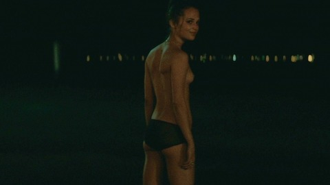 Alicia Vikander Nude as Tasha. Breasts, black panties, exposed back. 759764