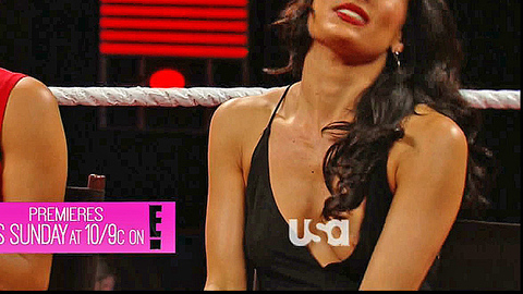 Brianna Garcia in WWE Raw (1993) Breasts Black Dress Breast Peeking Out 727415