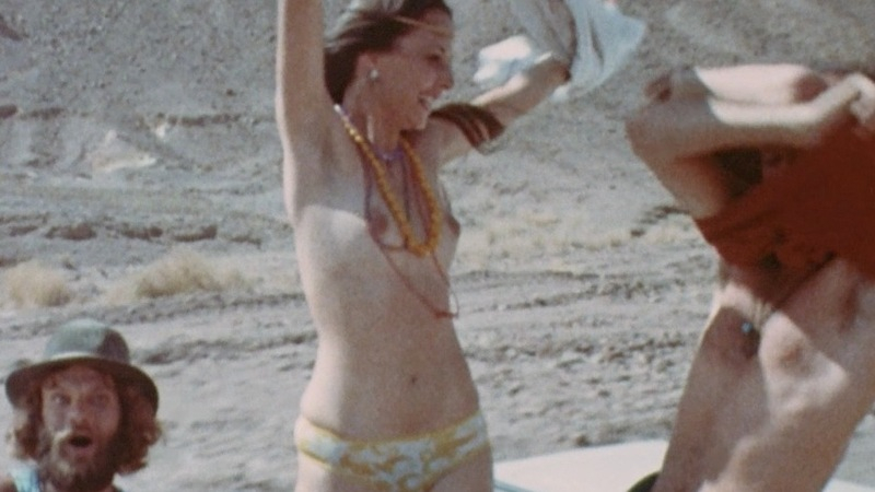Nudes of NA from An American Hippie in Israel. Breasts, couple, driving. 729456