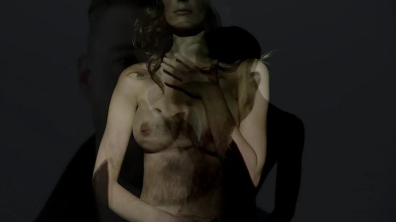 NA from Tunnel Vision Naked. Breasts, brunette, hand on chest. 763871