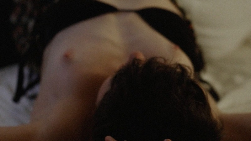 Rea Mole Nude in Amorous. Breasts, black hair, bra pulled down. 775150