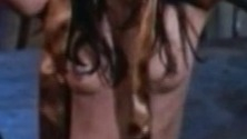 Nancy Kwan Naked in The McMasters. Breasts, hair covering breasts, headpiece. 779875