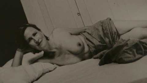 Christine Brücher Naked in Sand Castles. Breasts, black and white picture, lying down in bed. 781669
