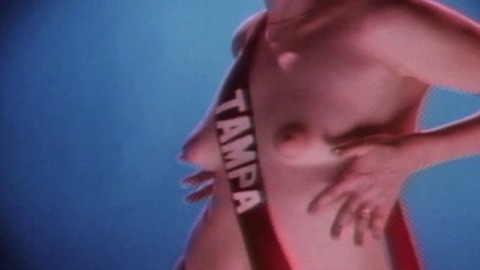 Nadette Stasa Nude as Miss Florida Dream Girl. Breasts, blonde, blue background. 791396
