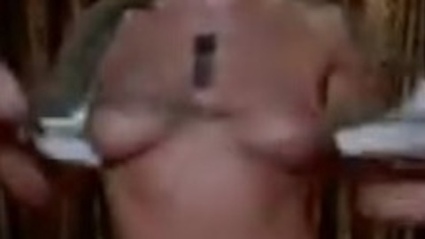 Nudes of Topless Dancer from Whoops Apocalypse. Breasts, army outfit, bullet belt. 800034